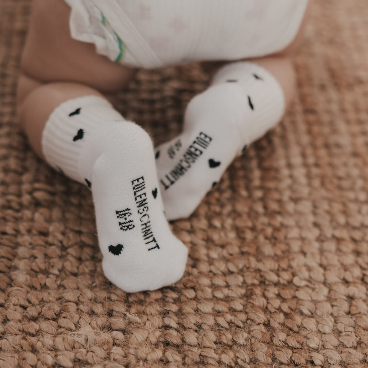 Babysocken 'Allover Herzen' schwarz